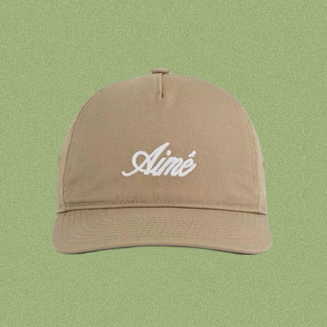 Aimé Leon Dore Cursive Script Hat - Tan Hover Image